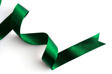 Green bow ribbon satin texture isolated on white