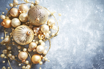 Golden Christmas Decorations on a Rustic Background