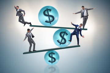 Businessman balancing in financial dollar concept