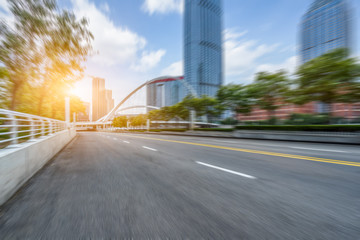 city road through modern buildings in Tianjin