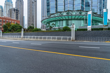 Fototapeta na wymiar Empty urban road and modern skyline in Tianjin