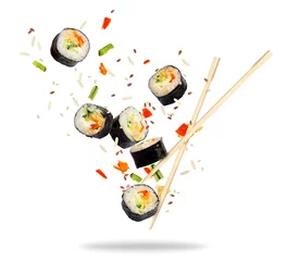 Zelfklevend Fotobehang Pieces of sushi frozen in the air isolated on white background © Krafla