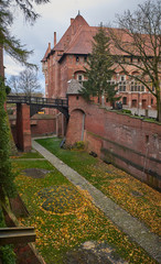 Inside area Castle of the Teutonic Order in Malbork, Poland. Red brick bildings and stone.