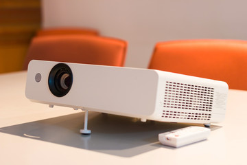 Closeup projector for presentation in a meeting room on Table