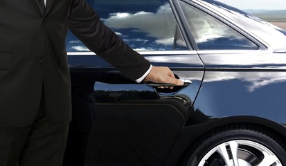 Driver hand opening car door