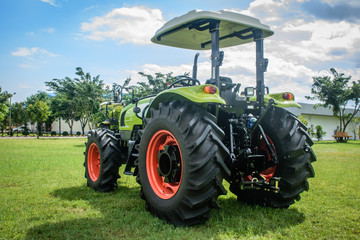 Obraz premium photo of brand new tractor on the ground