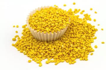 yellow bean in paper cup on white background