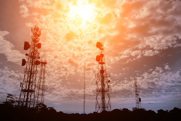 silhouette of Telecommunication mast television antennas on sunset