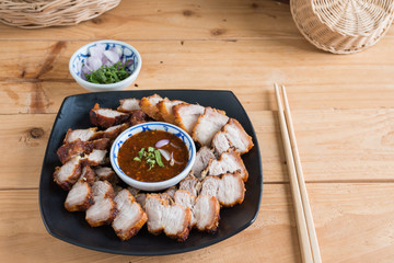 Deep Fried Crispy Pork Belly Cooked with Garlic and spicy dipping sauce