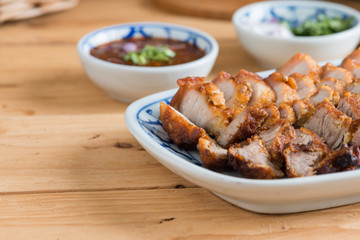 Deep Fried Crispy Pork Belly Cooked with Garlic and spicy dipping sauce