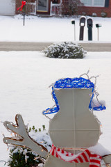 After Christmas Snowman Looking at Christmas Tree Portrait