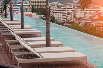 Sun beds is located at the rooftop pool for hotel customer