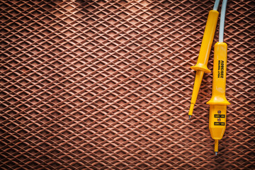 Electric tester on dielectric rubber mat