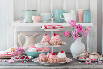 pink cakes on plate on white background