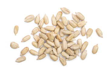 Peeled Sunflower seeds isolated on white background. Top view