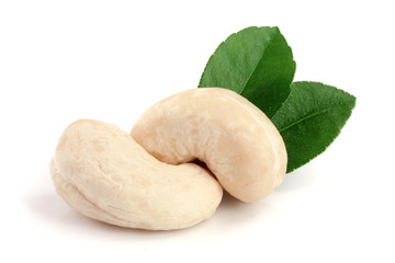 cashew nuts with leaf isolated on white background. macro