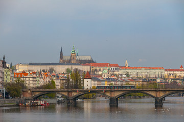 View of Charles bridge and the Castle over Vltava river in Prague, Czech Republic