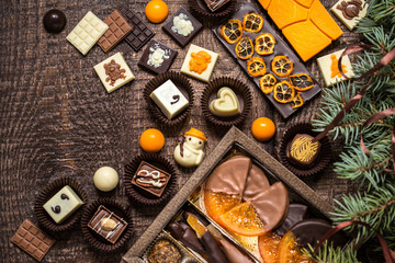 chocolate sweets, chocolates with Christmas symbols, toys, tree
