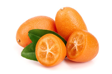 Cumquat or kumquat with leaf isolated on white background close up