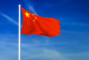 Waving flag of China on the blue sky background