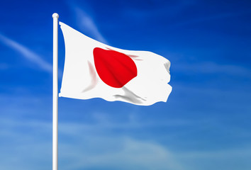 Fototapeta na wymiar Waving flag of Japan on the blue sky background