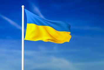 Waving flag of Ukraine on the blue sky background