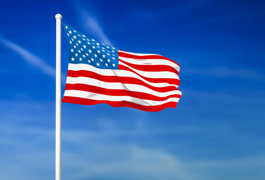 Waving flag of USA on the blue sky background