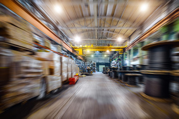 Large industrial shop, motion blur effect.