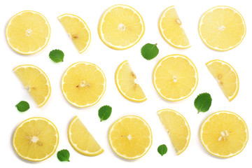 Fototapeta premium Slices lemon with mint leaves isolated on white background. Flat lay, top view