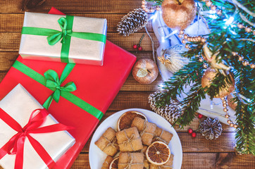 Christmas tree, toys and gifts top view.