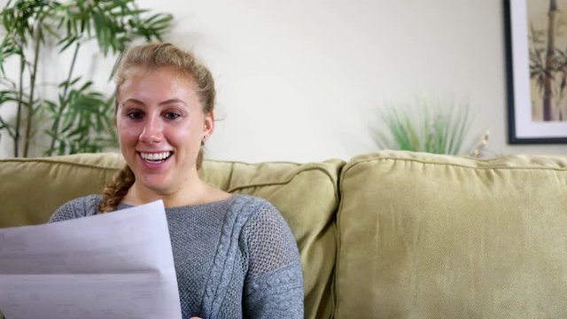 College student gets acceptance letter in the mail about university ALT