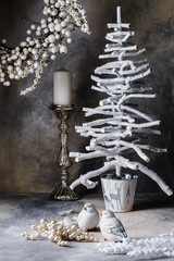 Christmas wreath tree candlestick doves on a dark gray background with divorces