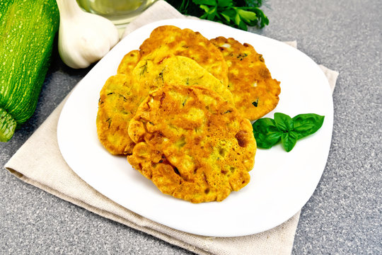 Flapjack chickpeas with zucchini in plate on granite table