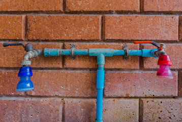 Close up of old faucet on tile for background, Old  tap  water, old faucet on concrete wall, save the water concep