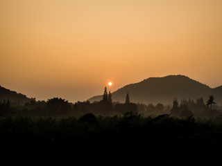 view of sunrise with the mountain in Thailand,Silhouettes image