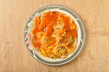 Oyster omelet,famous snack food at night market in Taiwan.