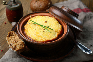 Onion soup with potato pancake