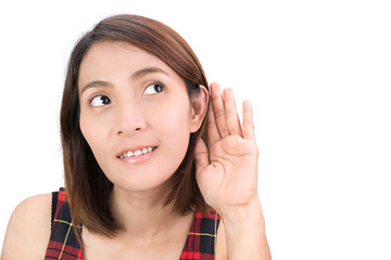 Fototapeta premium Asian woman hold her hand near her ear and listening
