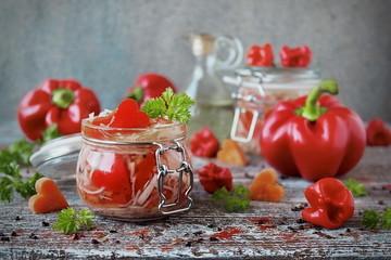 pickled cabbage with carrots and sweet pepper in glass jar