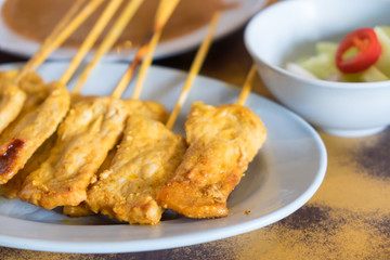 Pork Satay and sauce in plate on table