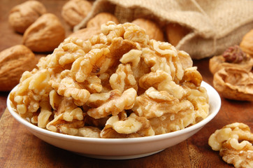 Walnut kernel  in a white bowl        