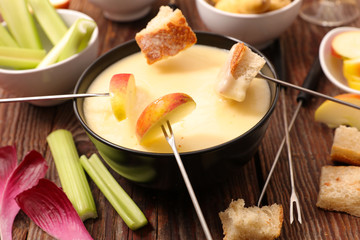 cheese fondue with fruit and vegetable