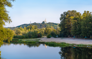 Fototapeta na wymiar River Vorskla Orthodox church on the mountain