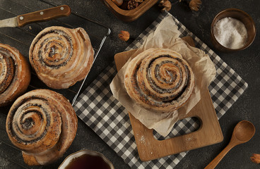 appetizing buns with poppy seeds, homemade pastries, pastry shop.