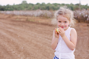 Portrait of cute 6 years old girl outdoors