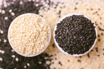 Black and white sesame seeds. Copy space. Top view.