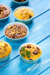 Fresh muffins with nuts and chocolate