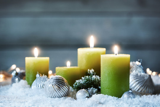 Decorative burning Christmas candles