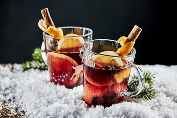 Tasty mulled red wine with orange and cinnamon