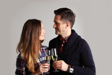 Couple clinking glasses of champagne